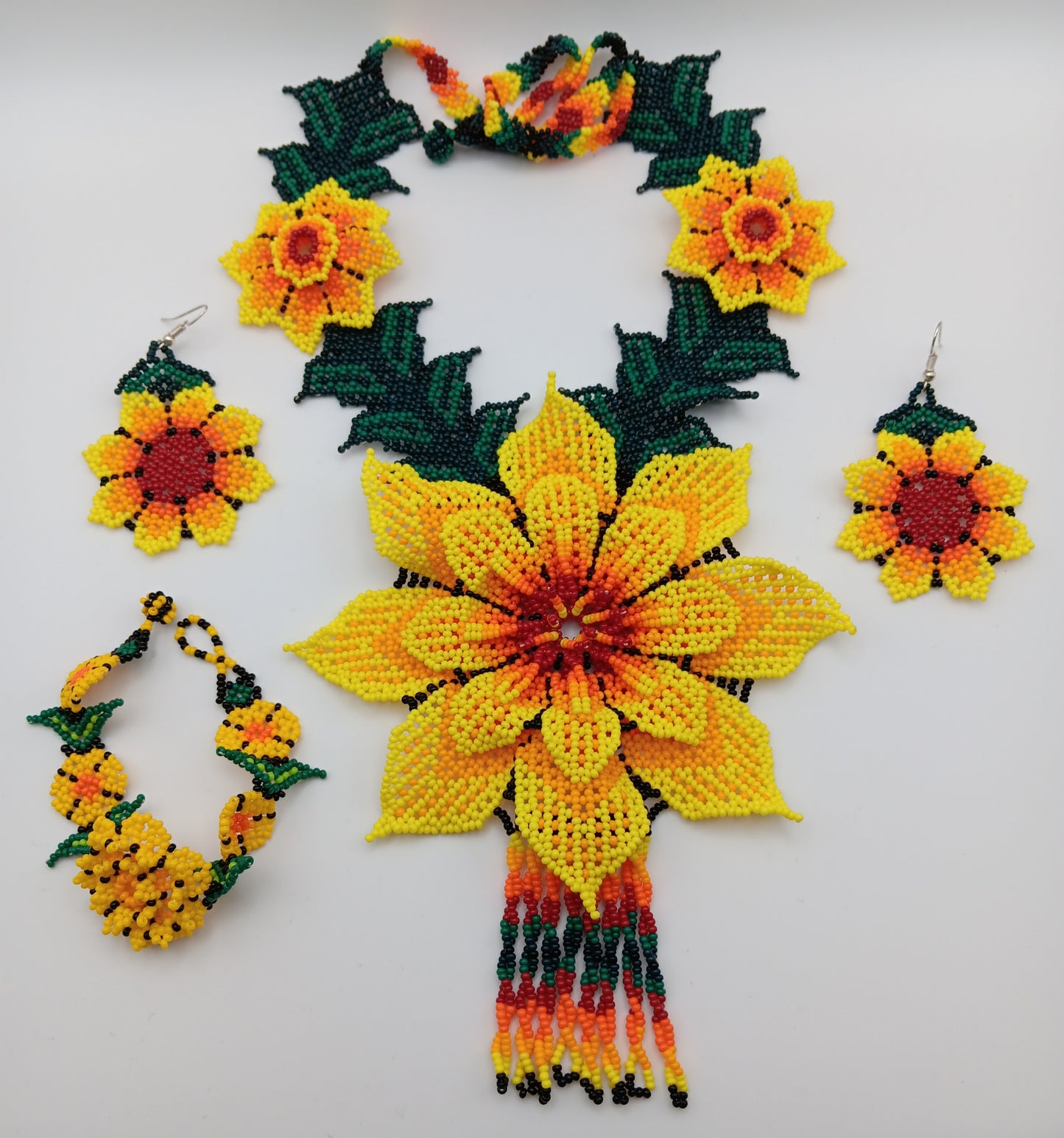 Necklace, earrings, and bracelet set.